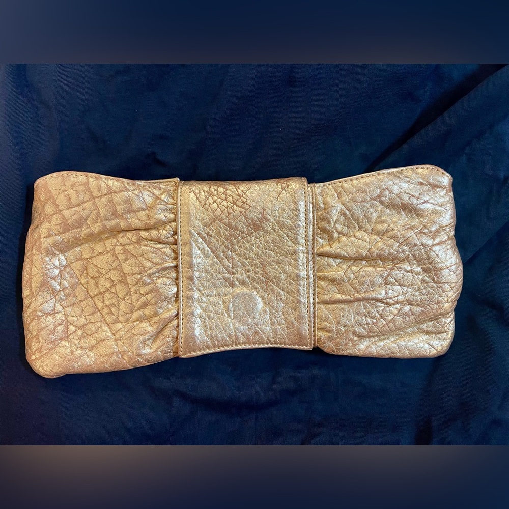 Heather Hawkins gold clutch